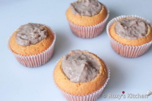 Strawberry Cupcakes - Fill each cupcake with strawberry filling