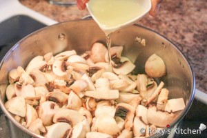 Marinated Mushrooms - Add mushrooms to a pot & pour oil over