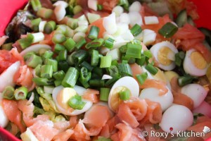  Salad with Smoked Salmon & Quail Eggs - Combine the lettuce, eggs, cucumber, green onions and smoked salmon.