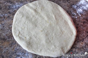 Easter Cake with Cheese (Pasca cu Branza) - Roll one part of the dough. 