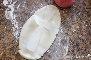 First Communion Book Cake - Cut fondant white cross using paper template