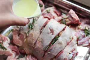 Roasted Lamb with Garlic & Rosemary -  Sprinkle with salt, pepper and thyme and drizzle oil over the lamb