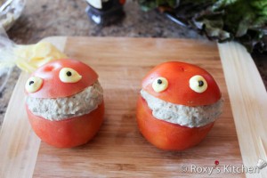 Funny Tomato Frog Stuffed with Eggplant Salad - Pipe two mayo eyes and stick two peppercorns as seen below.