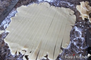 Rhubarb & Strawberry Pie - Cut strips of pastry, approximately 1.5 cm wide, using a sharp knife.