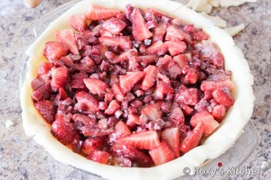 Rhubarb & Strawberry Pie - Pour the filling into the pie crust.