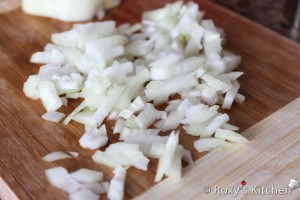 Cream of Mushroom Soup - Chop the onions.