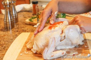 Beer Roasted Chicken - Season it with some freshly ground pepper and paprika as well.