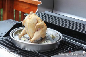 Beer Roasted Chicken - Transfer the chicken on the grill and cook it keeping the lid closed