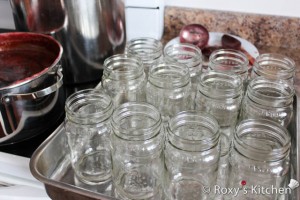 While your jam is simmering, wash the jars in soapy water and rinse them thoroughly. Allow them to drip-dry for 15-20 minutes and then place them in a pan (or right on the rack) in the oven set to 225F (100C) to sterilize the jars. 