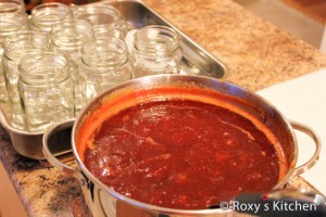 Carefully remove the jars from the oven. Pour jam into hot sterilized canning jars. It’s better to pour half a ladle of jam in each jar to allow the jar to reach almost the same temperature as the jam. 