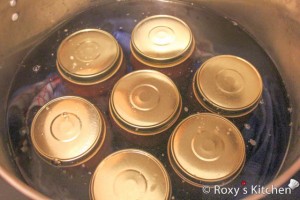 Add enough hot water to cover the jars by 2-3 cm. Bring the water to a gentle boil and process them for 15-20 minutes.