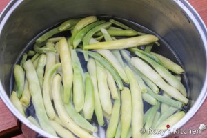 Green Beans with Garlic & Mayo - Place beans in a pot with water & salt and bring to a boil. 