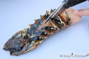 Grilled Lobster Tails - Using a kitchen scissors cut through the center of the back shell.