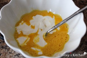 Country-Style Soup (Ciorba Taraneasca) - Whisk the eggs in a bowl and add the sour cream.