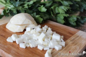 Country-Style Soup (Ciorba Taraneasca) - Cut the celery root into small pieces and add it to the soup. 