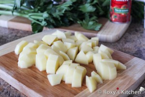 Country-Style Soup (Ciorba Taraneasca) - Chop pepper and potatoes and add to the pot.