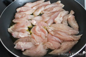 Chicken Breast with Plums  - Heat the olive oil in a pan over medium heat and add the chicken breast. 
