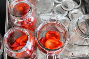Marinated Red Pimento Peppers - Arrange the peppers in the hot jars without pressing them. 
