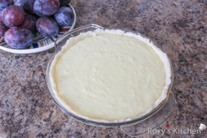 Plum Tart  - Pour the filling into the pie crust.