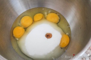 Add eggs, sugar, vanilla extract in a bowl of a stand mixer