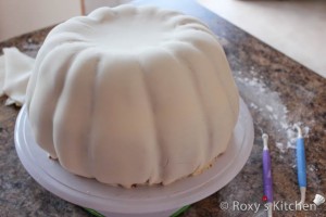 Pumpkin Cake - Use the small and big ball tools and then your fingers to make some lines and sculpt the cake into a pumpkin shape.