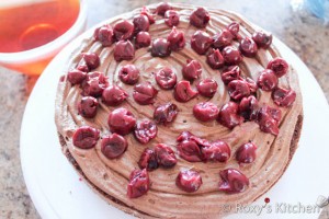 Topsy Turvy Chocolate Cake - Spread some sour pitted cherries on top