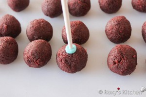 Dip the cake ball into the melted coating, don't swirl the cake pop around in the coating, just dip and get out.