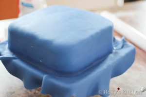 Cover the cake with fondant