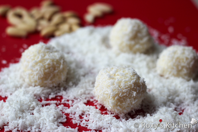 Homemade Raffaello Almond Coconut Candies - Roll each candy in coconut and you’re done.