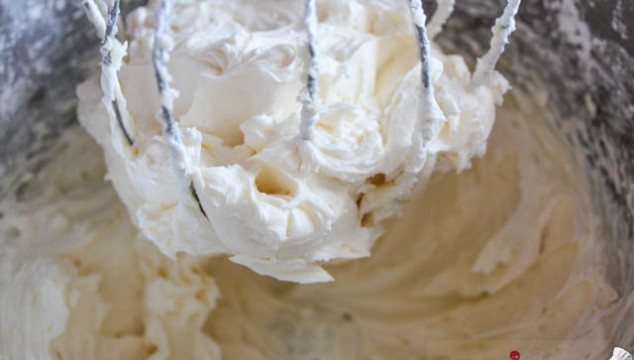 Vanilla Buttercream - Add the water and continue to mix until light and fluffy, 2 to 3 minutes.