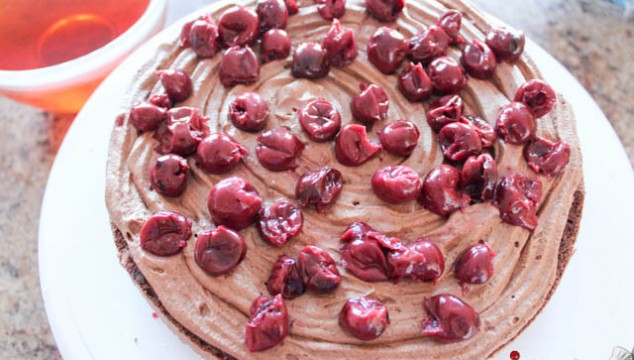 Topsy Turvy Chocolate Cake - Spread some sour pitted cherries on top
