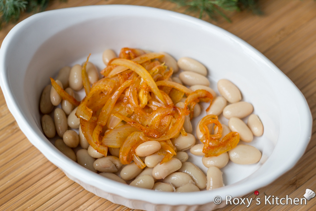 5-Ingredient Beans with Roasted Peppers and Onions -  In an oven-proof dish add 1/3 of the beans, half of the cooked onions.