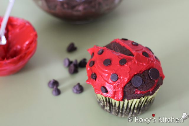 Ladybug Cupcakes - Place a few small chocolate chips on each wing. Attach two big chocolate chips for the eyes.   To make the mouth, use a toothpick to carefully add some red frosting. 