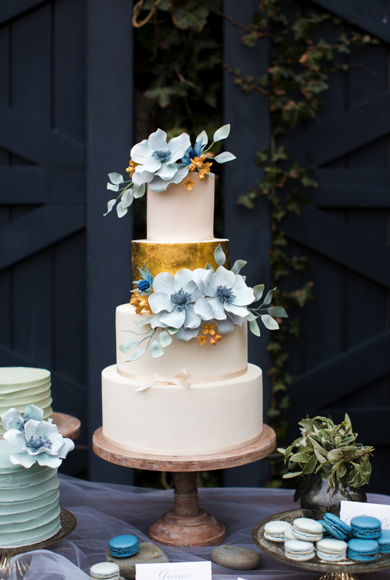 Modern Wedding Cake (white, golden, blue) - Check out 14 Fabulous Wedding Cakes with Modern Flair!