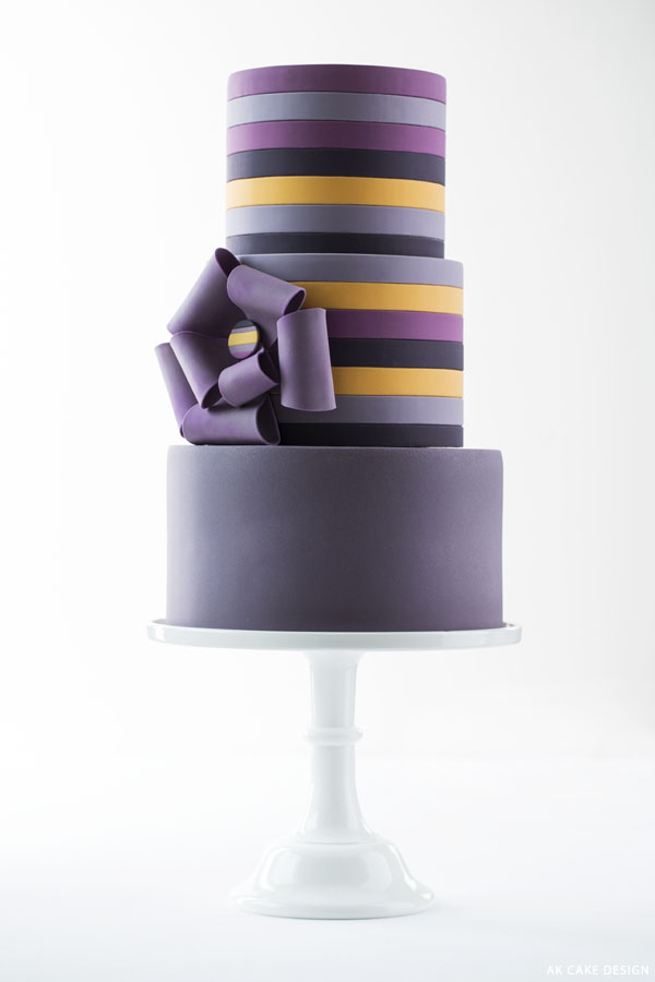 Purple Stripe Cake - Check out 14 Fabulous Wedding Cakes with Modern Flair!