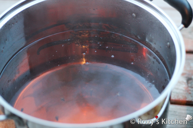 Bring the water, sugar and spices to a boil and remove from heat. 