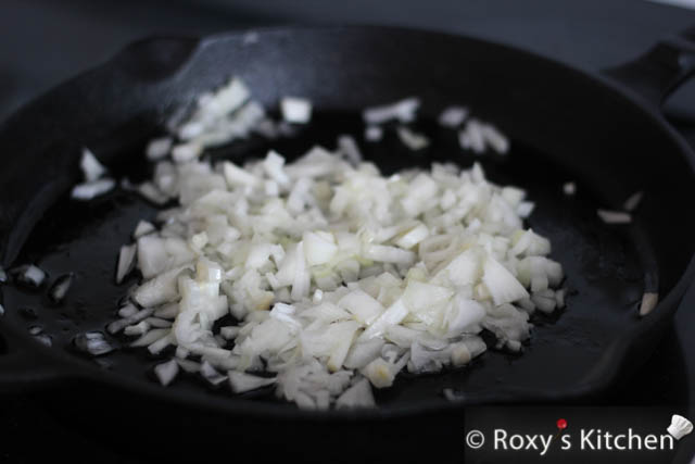 Peel and chop onions. Heat the oil in an oven-proof pan over medium heat and cook the onions until translucent (~ 8-10 minutes).