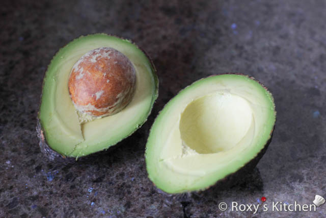 Slice the avocado lengthwise and remove the pit. 