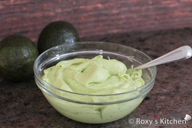 Scoop out the avocado flesh with a spoon. Then, add the lemon juice over the avocado and mash it and using a blender. Add the mustard and mix it well with the blender. Add the oil one tablespoon at a time while blending everything together. 