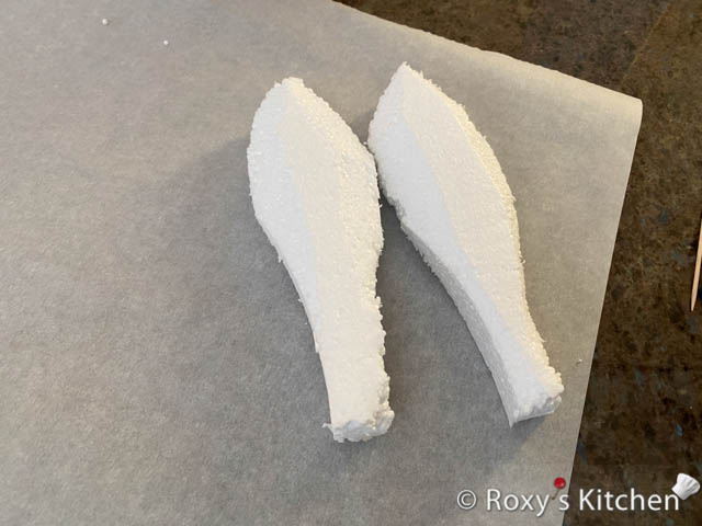 Cut two ears out of styrofoam.