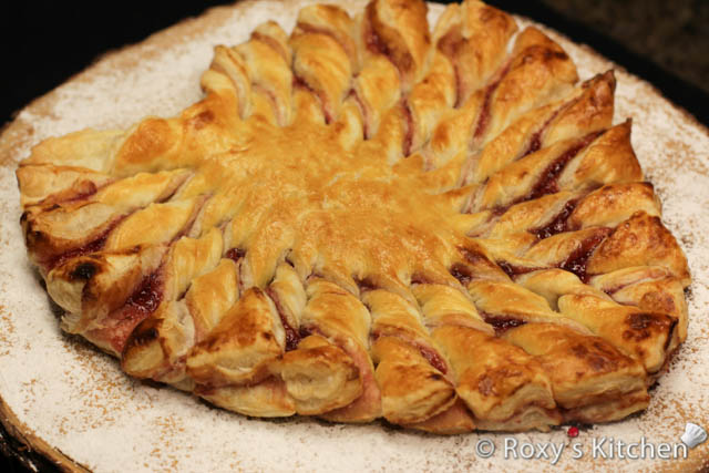 Bake the heart-shaped puff pastry in the preheated oven for 15-20 minutes or until golden brown and puffed.