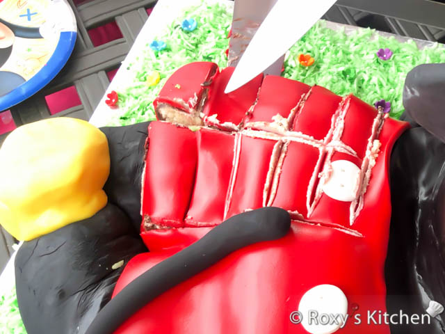 Slicing the Mickey Mouse Cake
