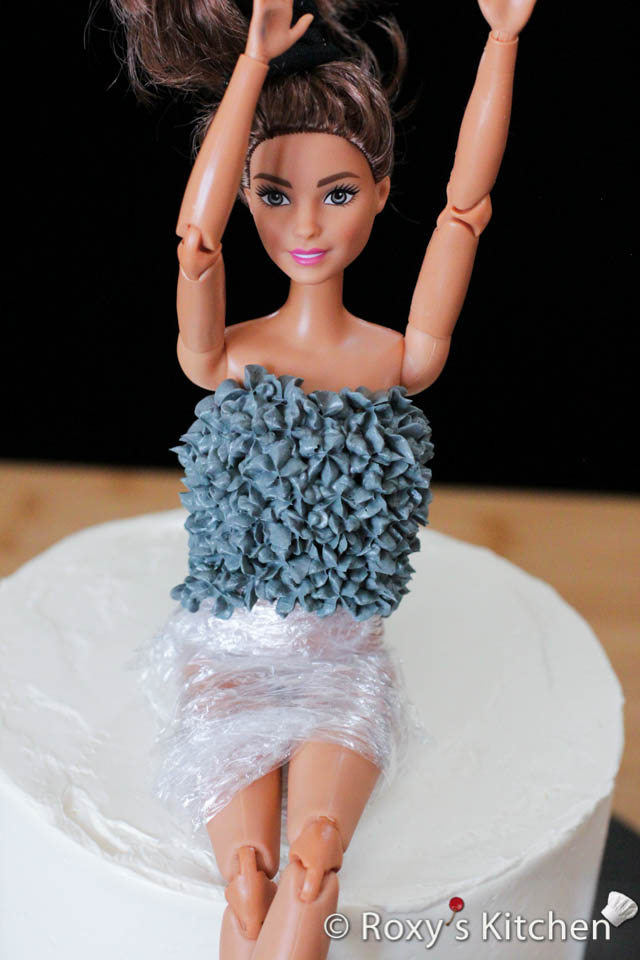 Barbie Doll Birthday Cake with Pink Icing and Decorations