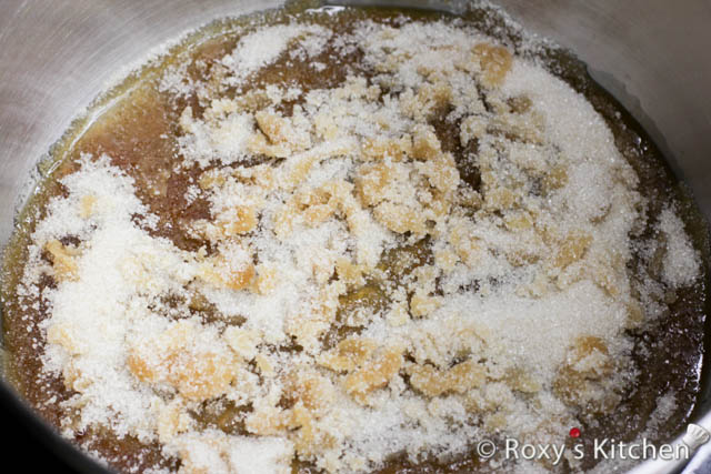 Place 175 g sugar in a heavy skillet over low-medium heat and stir until the sugar is melted and light brown.
