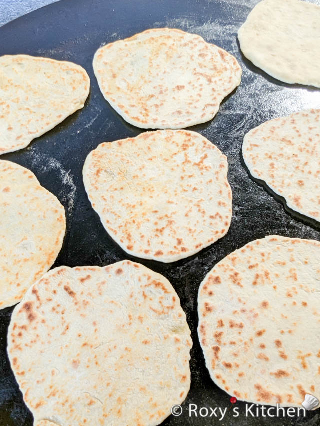 Cook each pita bread on medium heat on a flat top grill or on a cast iron griddle placed on the barbecue grill. Cook the pitas two minutes on one side, flip them and cook one more minute. 