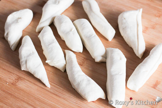 Cut your pizza dough into 12 equal pieces. 