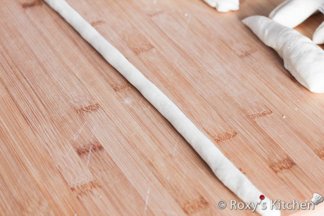 Roll each piece into a thin rope.