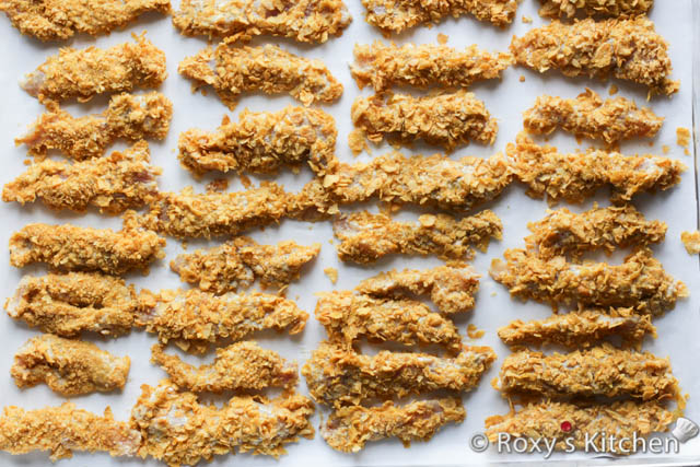 Place the chicken strips on the prepared baking tray, and bake for 20 minutes, until golden brown and crispy. 