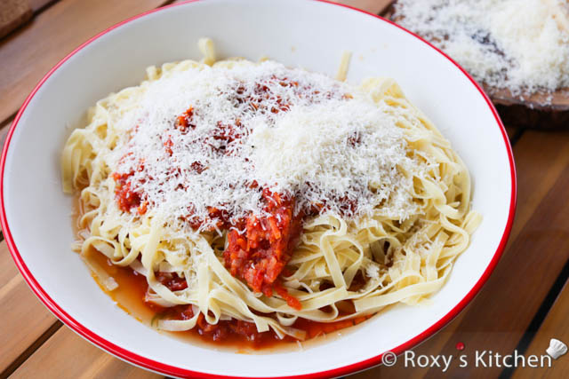 Quick & Easy Italian Pasta - Place the cooked pasta on top and add the remaining tomato sauce and grated parmesan.
