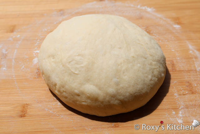 Turn it out onto a lightly floured surface, knead it a few times.